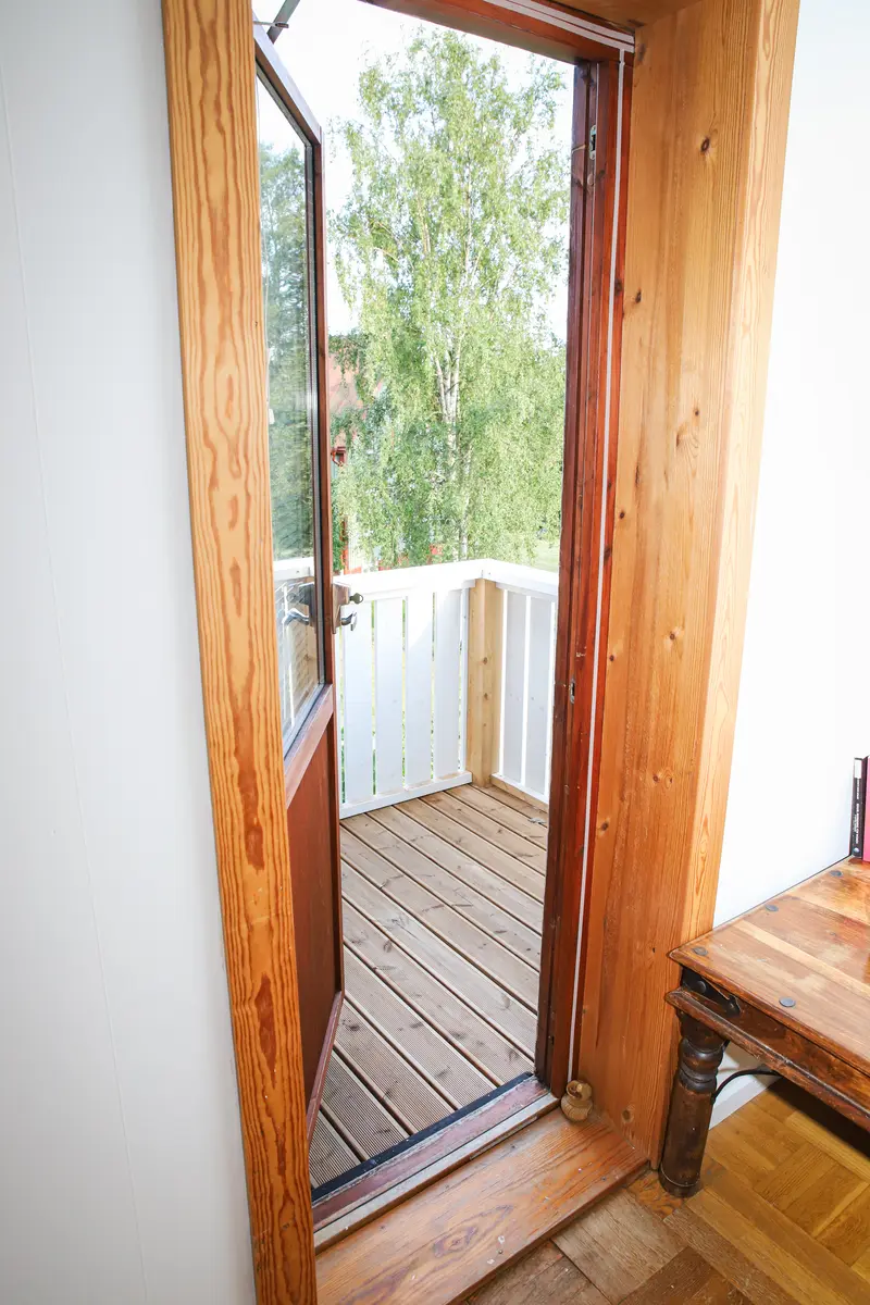 The master bedroom has a small balcony