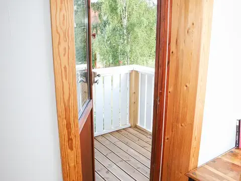 The master bedroom has a small balcony